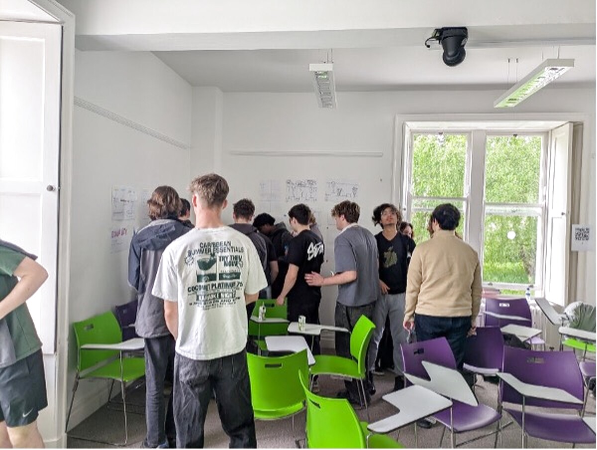Young people sharing ideas around a classroom wall during a Republic of Ireland participation session